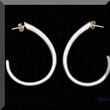 J081. Large silver hoop earrings. - $18 